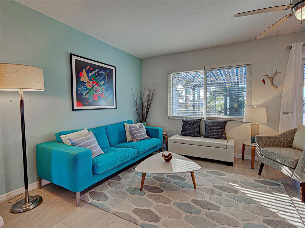 1350 Lakeside Drive Venice, FL 34293 - Photo 18 of 64 a living room with furniture and a large window