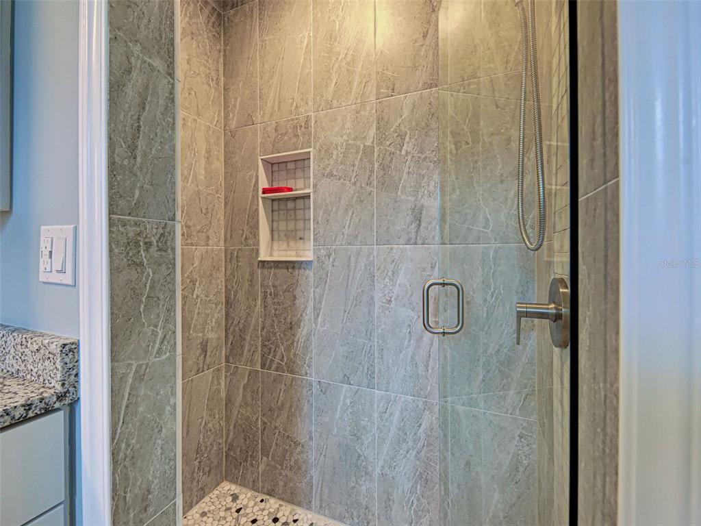 1350 Lakeside Drive Venice, FL 34293 - Photo 26 of 64 a bathroom with a shower