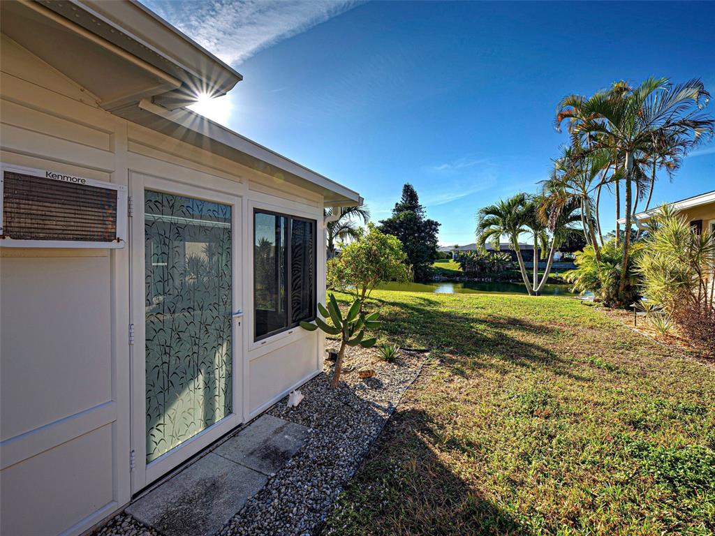 1350 Lakeside Drive Venice, FL 34293 - Photo 37 of 64 a view of a house with backyard and sitting area