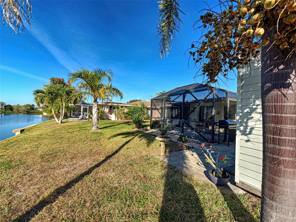 1350 Lakeside Drive Venice, FL 34293 - Photo 40 of 64 a view of swimming pool with outdoor seating