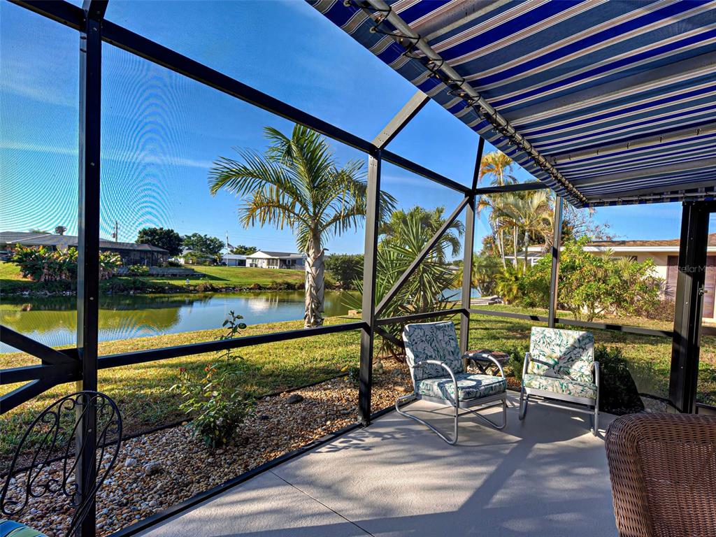1350 Lakeside Drive Venice, FL 34293 - Photo 47 of 64 a view of swimming pool with a patio and a yard