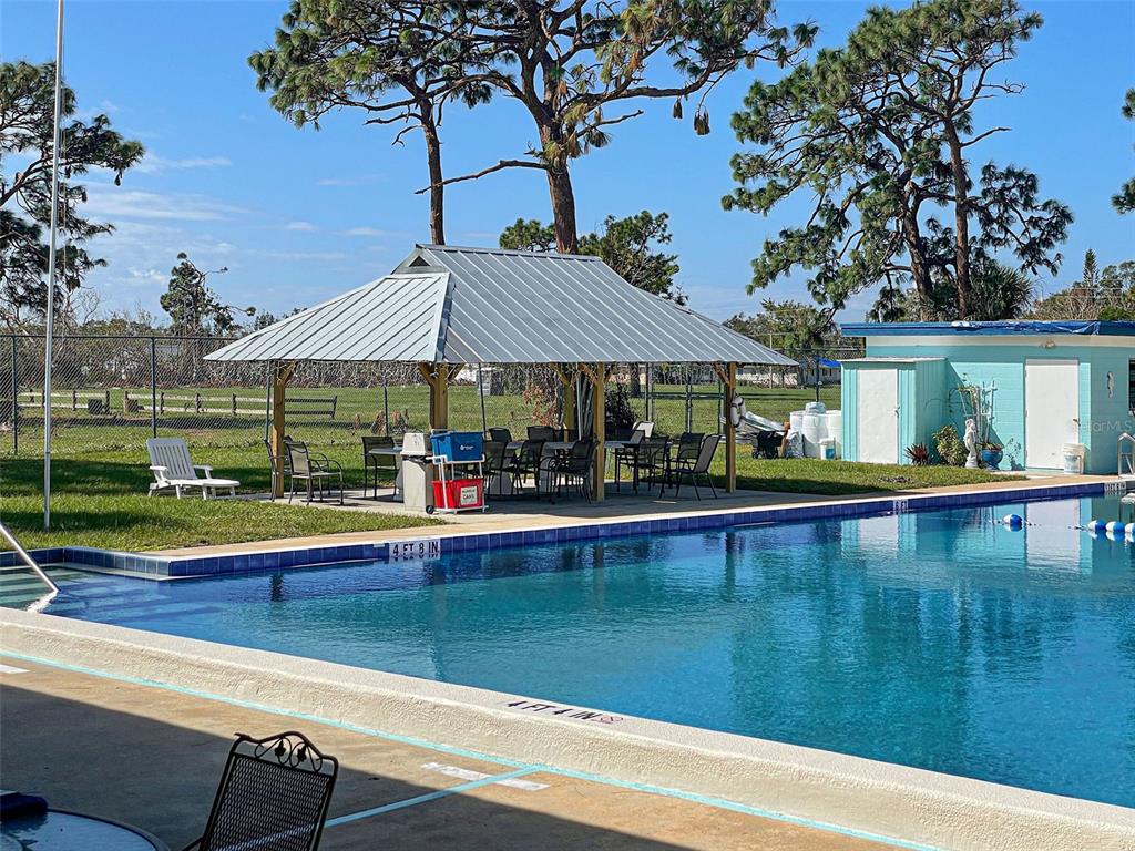 1350 Lakeside Drive Venice, FL 34293 - Photo 64 of 64 a view of swimming pool with sitting area
