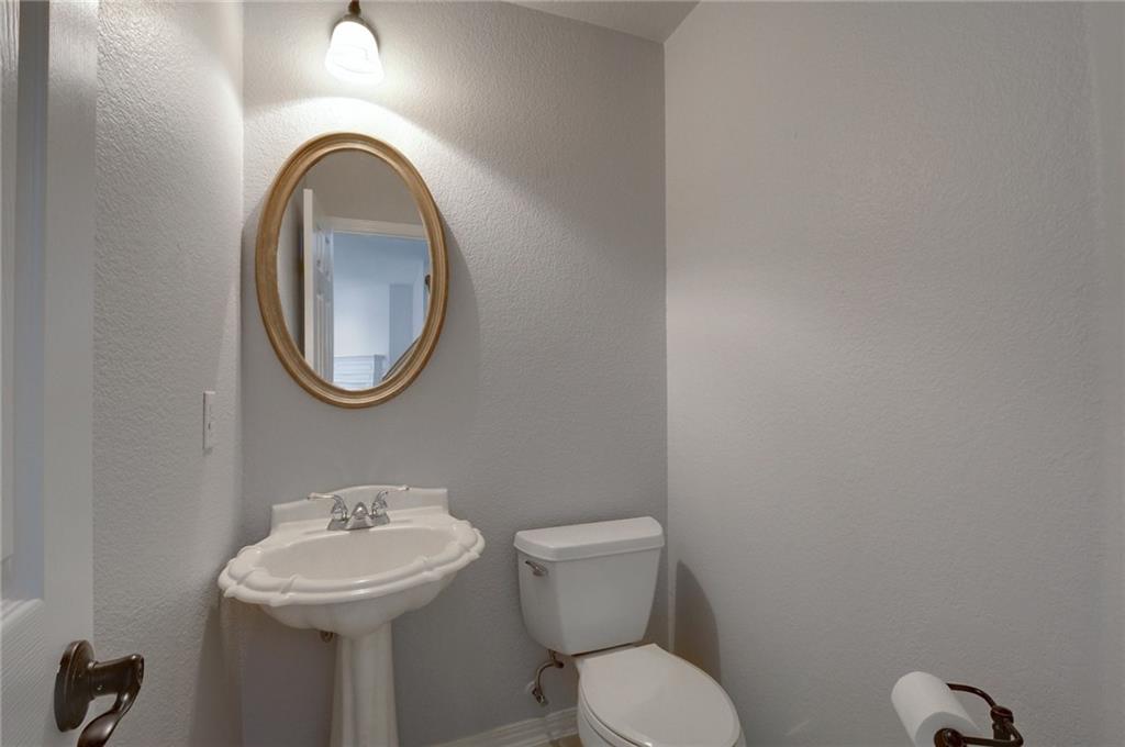 13017 Titus Court Austin, TX 78732 - Photo 16 of 26 Bathroom with a textured wall