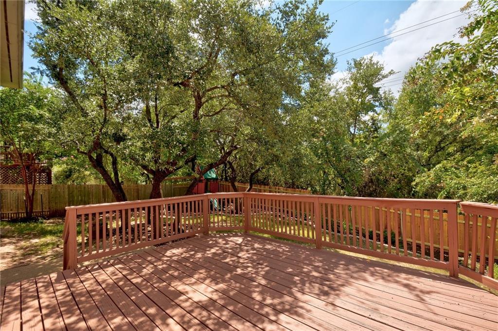 13017 Titus Court Austin, TX 78732 - Photo 21 of 26 Deck with a fenced backyard