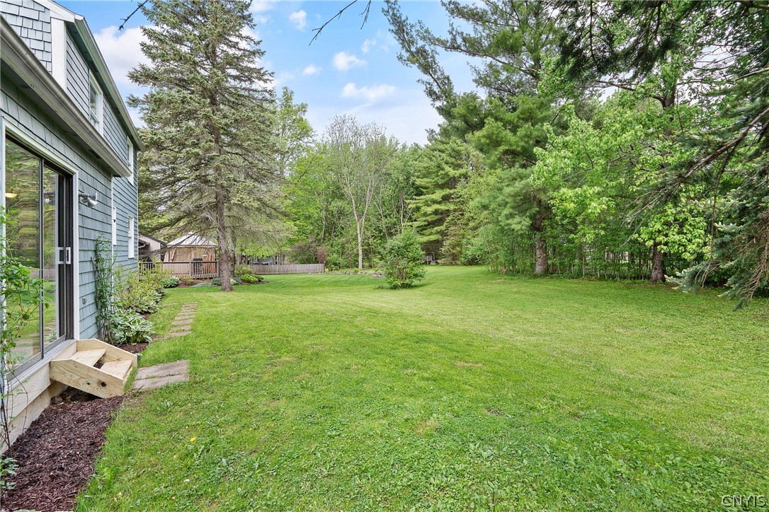 8841 Wandering Way Lysander, NY 13027 - Photo 37 of 42 Private backyard with plenty of space for a patio, pool or yard games.