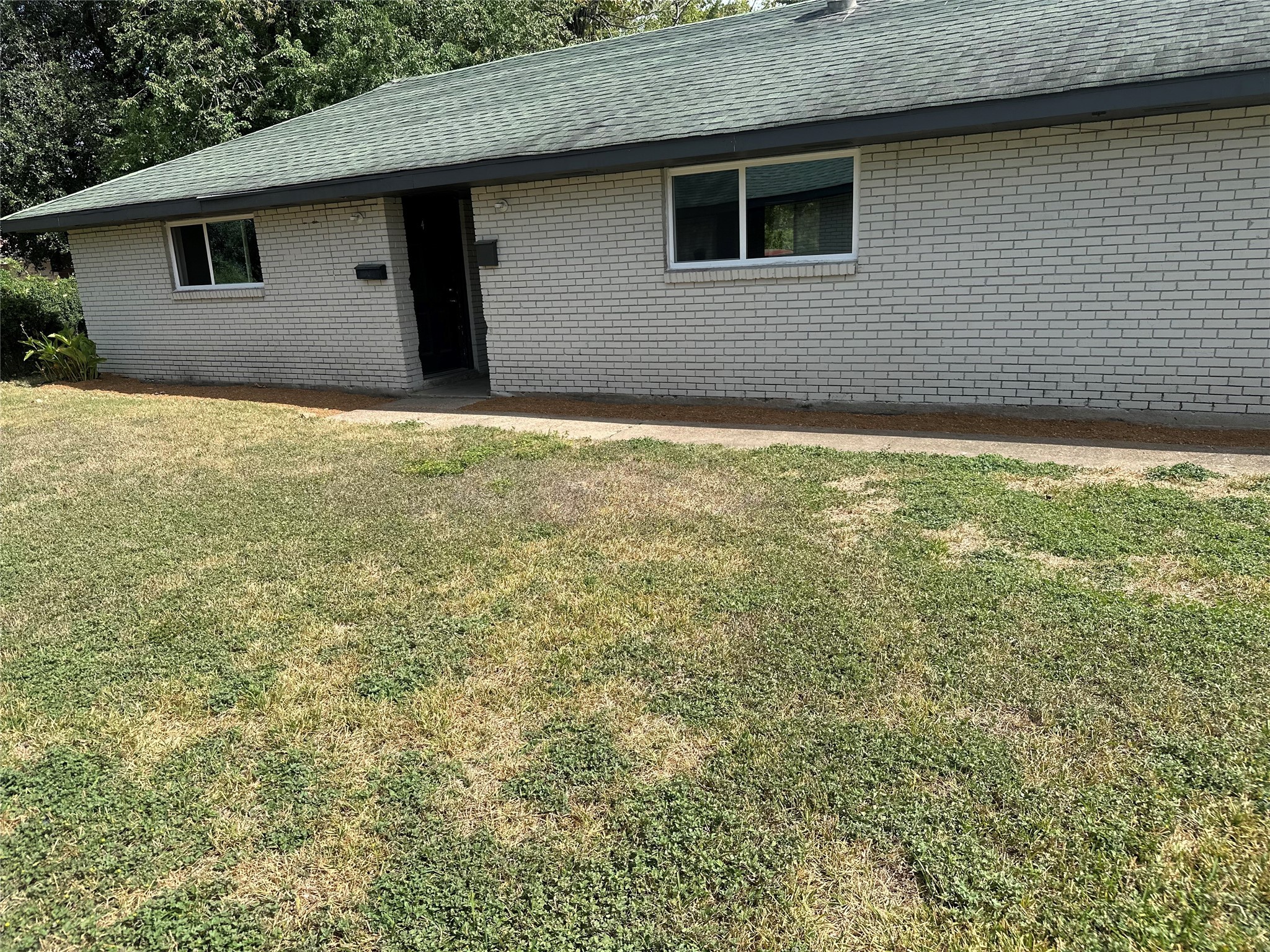 5405 Suez Street, Unit 1 Houston, TX 77020 - Photo 16 of 17 a house view with a backyard space