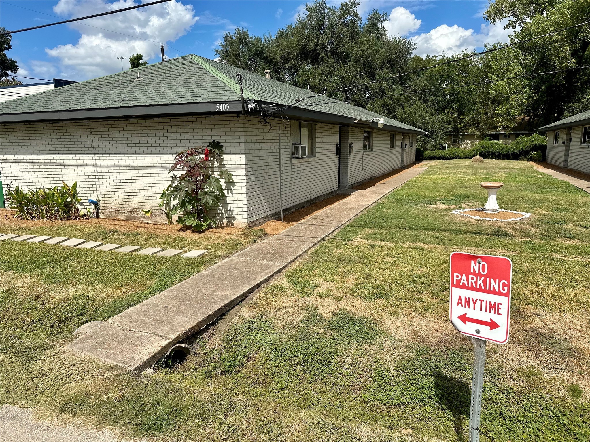 5405 Suez Street, Unit 1 Houston, TX 77020 - Photo 17 of 17 a view of outdoor space with a garden