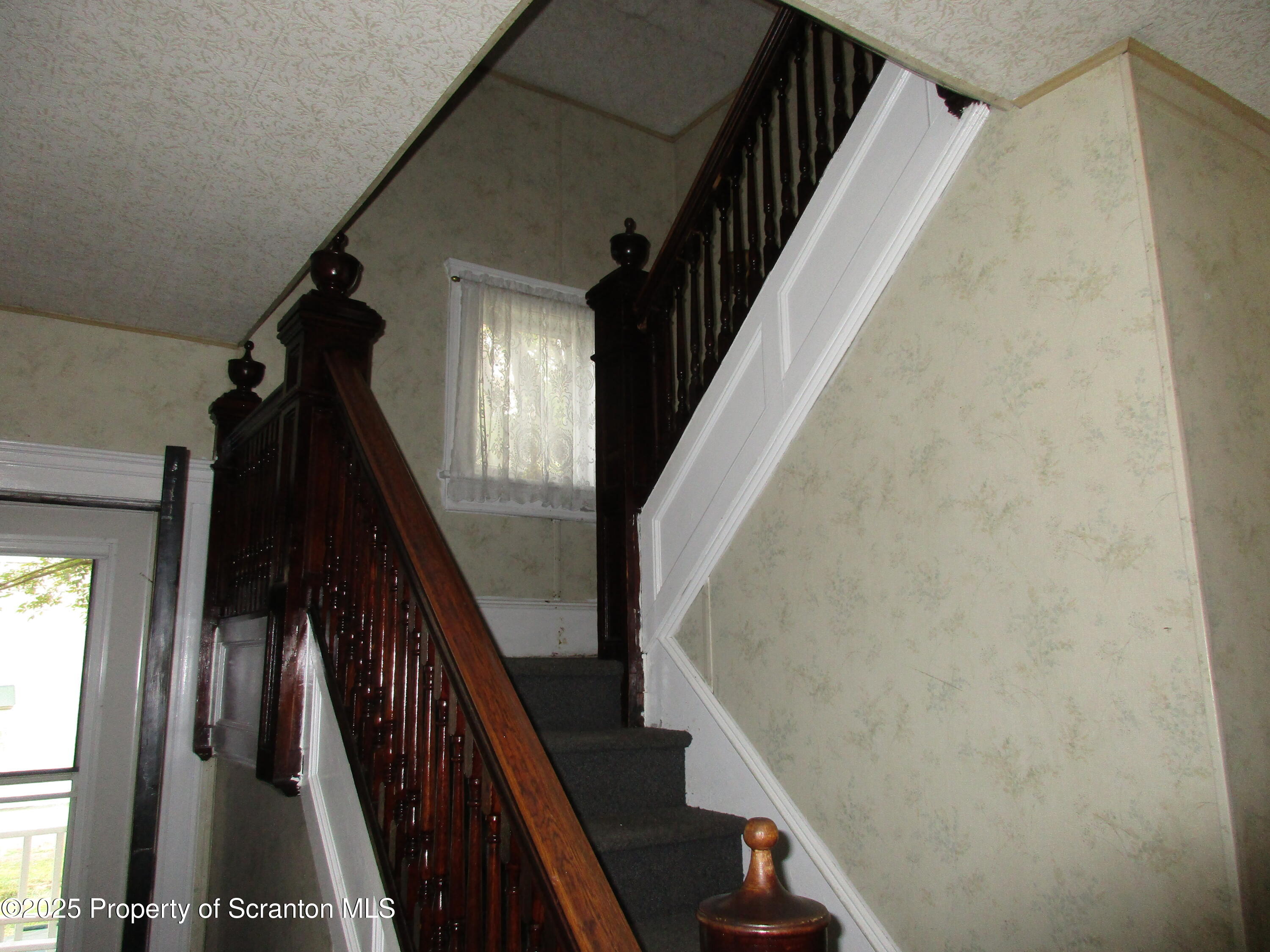 24 Oak Street Nicholson, PA 18446 - Photo 11 of 17 a view of entryway with wooden floor