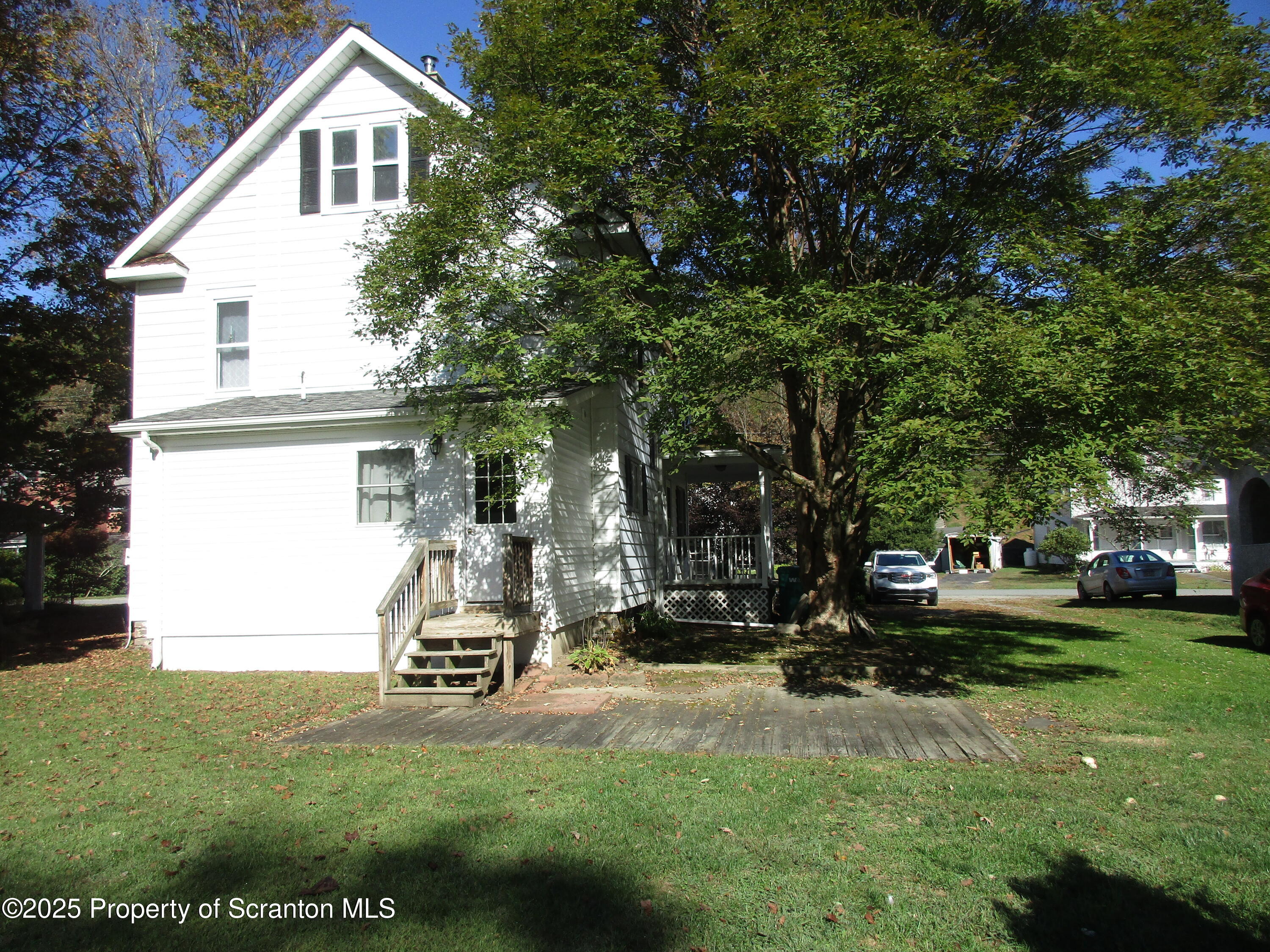 24 Oak Street Nicholson, PA 18446 - Photo 3 of 17 a house view with a garden space