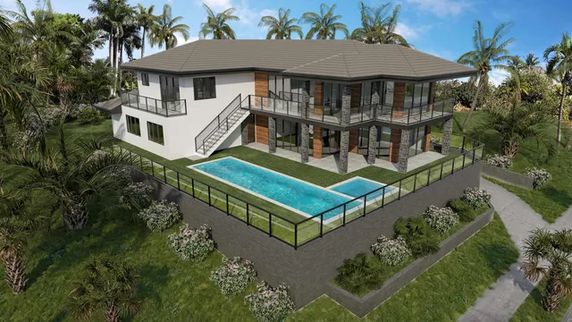 an aerial view of a house with roof deck front of house