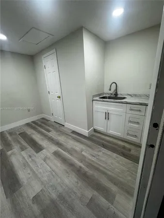 a view of a livingroom with a sink