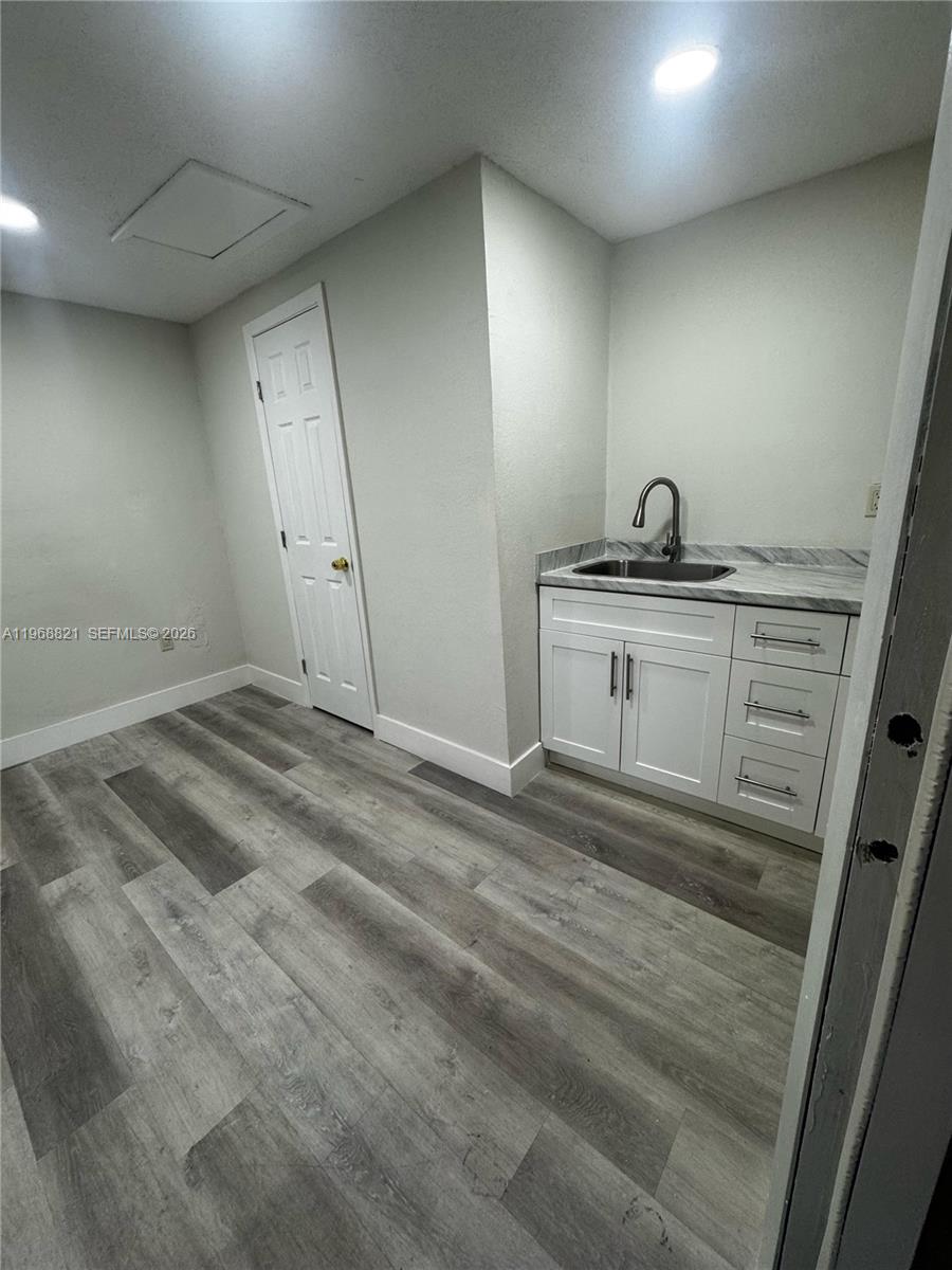 582 East 18th Street, Unit C Hialeah, FL 33013 - Photo 5 of 13 a view of a livingroom with a sink