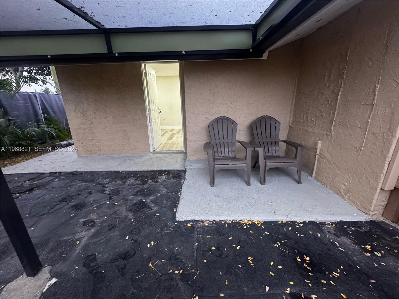 582 East 18th Street, Unit C Hialeah, FL 33013 - Photo 10 of 13 a view of a room with furniture and window