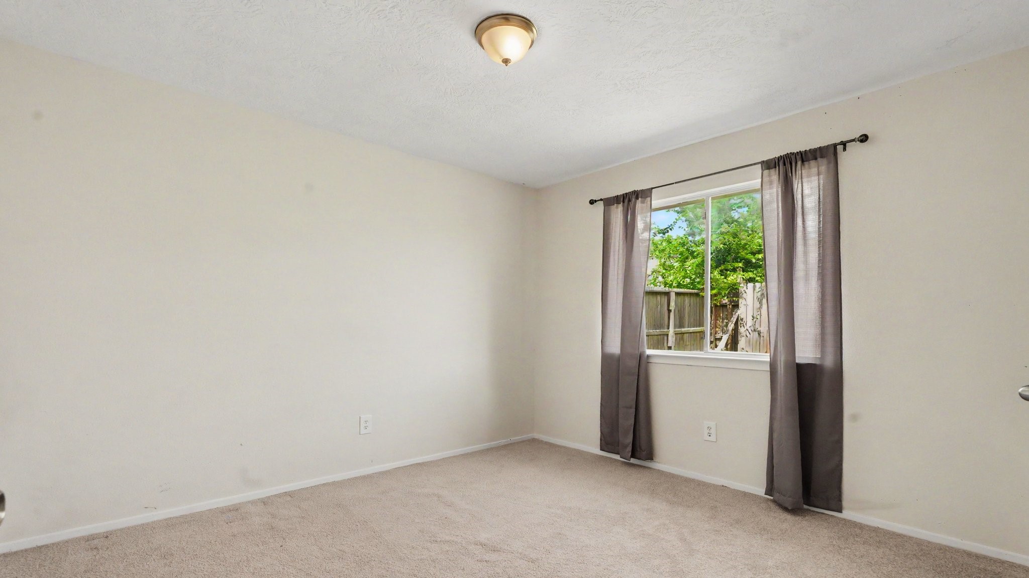 1506 Holbech Lane Channelview, TX 77530 - Photo 12 of 21 an empty room with a window