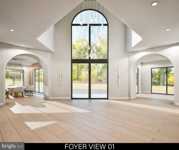 a living room with furniture and white walls