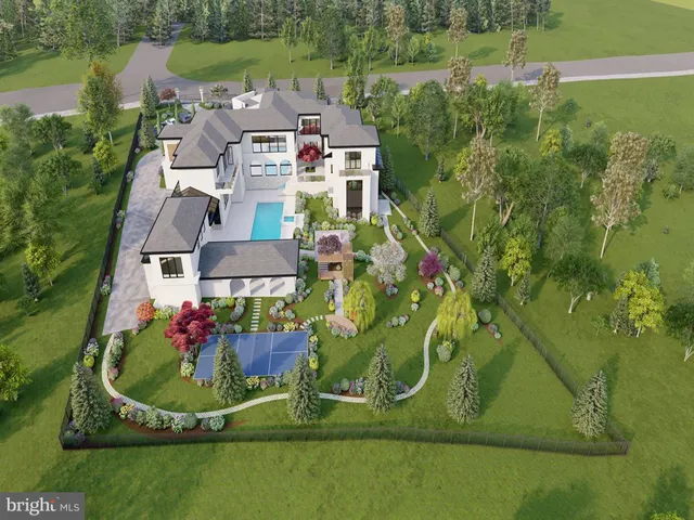 an aerial view of a house with garden space and street view