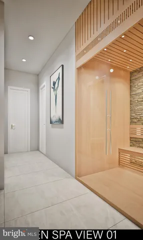 a bedroom with a bed and a night stand