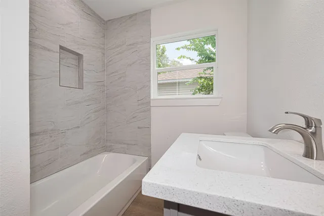 a bathroom with a bathtub