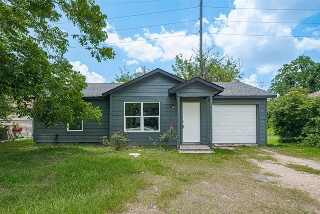 a front view of house with yard