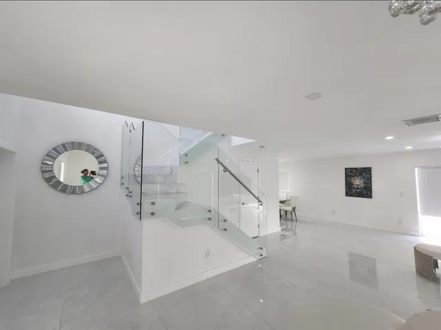 an entryway with a fan