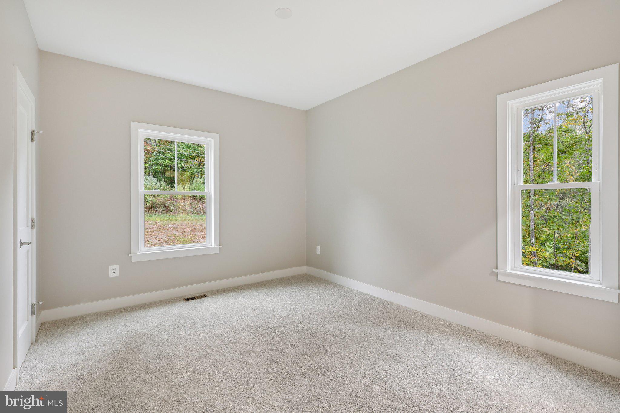 10643 Settle School Road Rixeyville, VA 22737 - Photo 21 of 40 an empty room with a window
