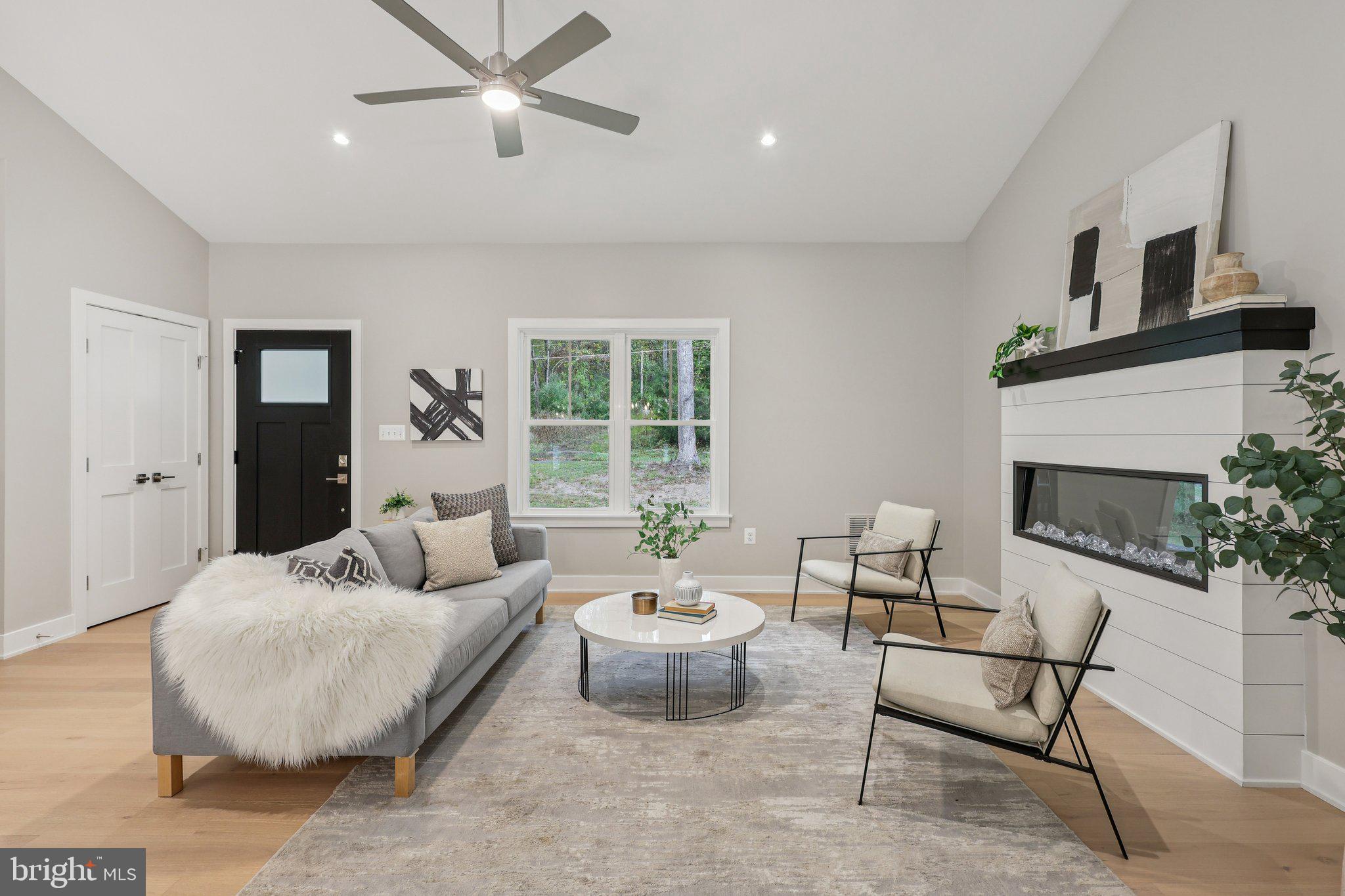 10643 Settle School Road Rixeyville, VA 22737 - Photo 3 of 40 a living room with furniture and a fireplace