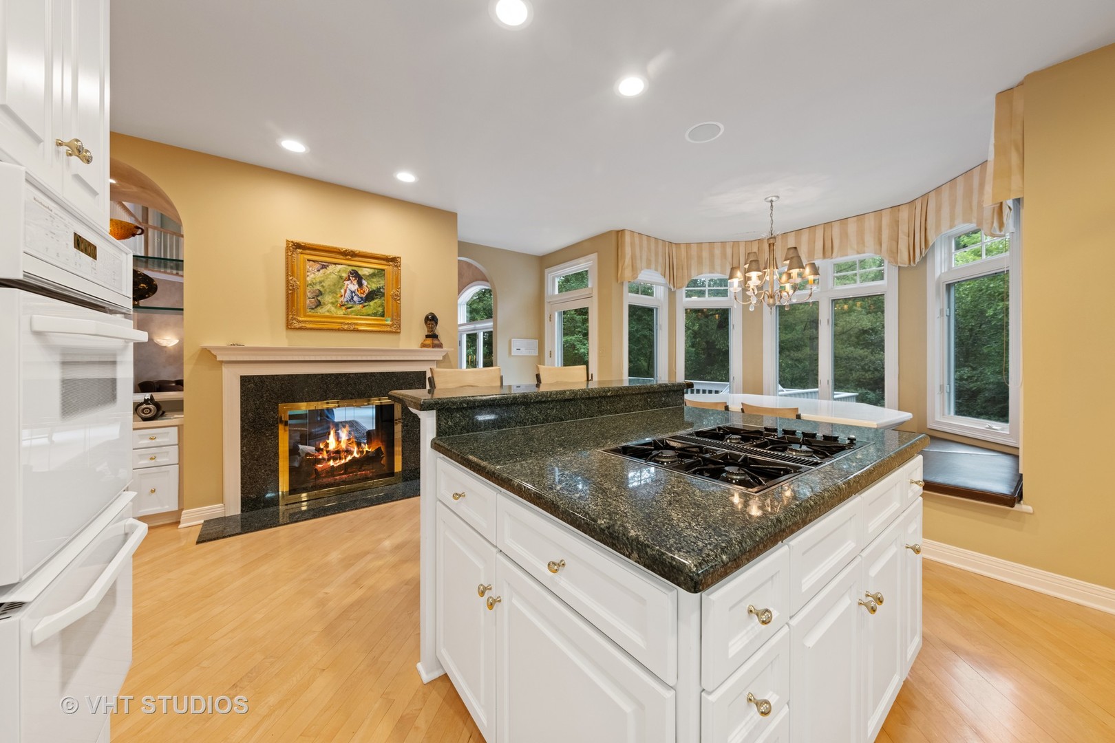 9301 Falling Waters Drive East Burr Ridge, IL 60527 - Photo 20 of 44 a kitchen with stainless steel appliances granite countertop a stove and a sink