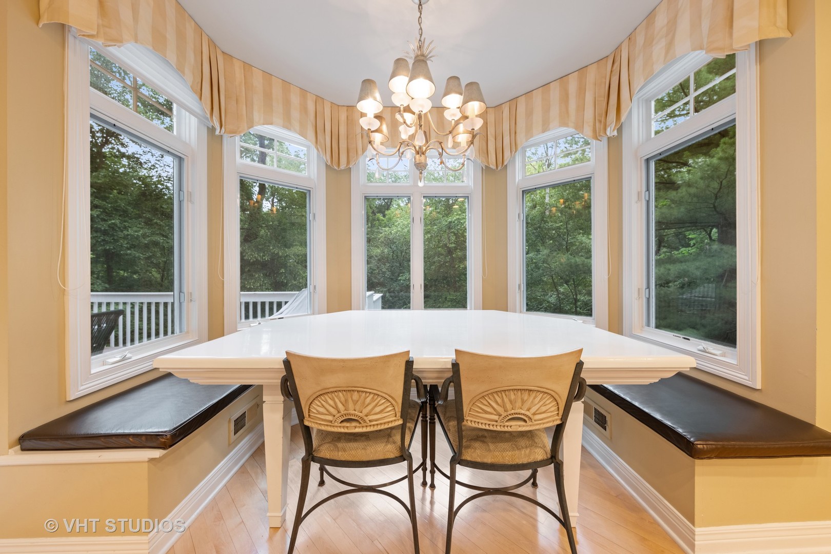 9301 Falling Waters Drive East Burr Ridge, IL 60527 - Photo 21 of 44 a dining room with furniture and large windows