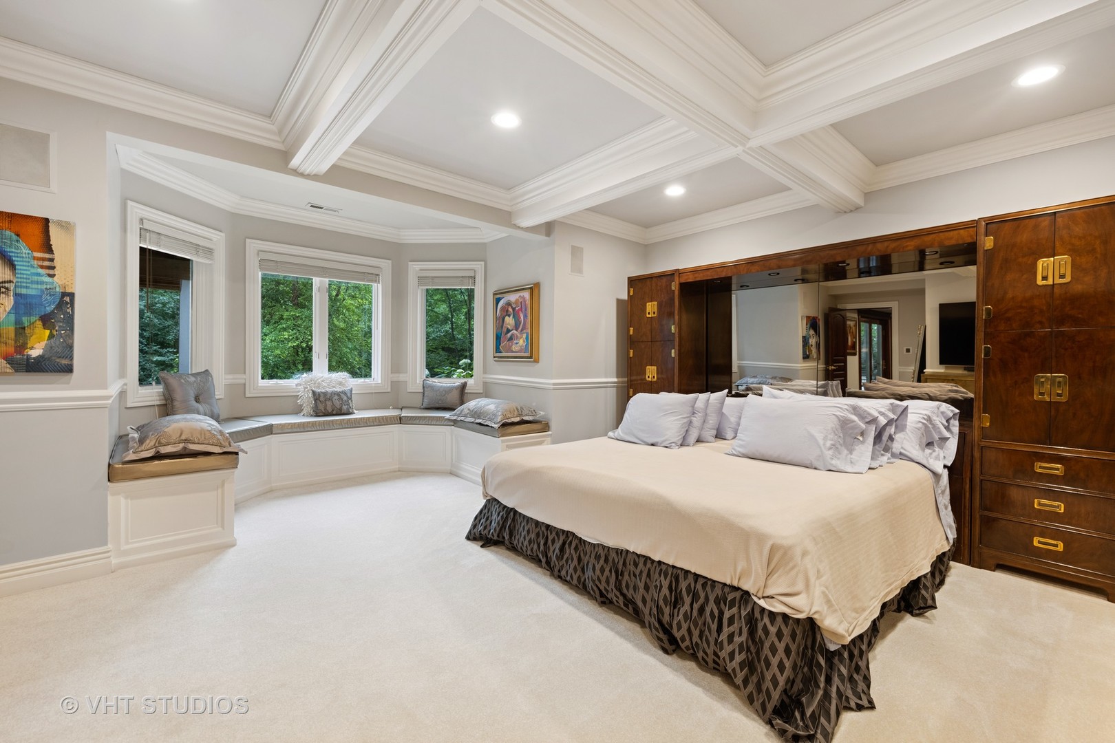 9301 Falling Waters Drive East Burr Ridge, IL 60527 - Photo 27 of 44 a large bedroom with a large bed and a large window