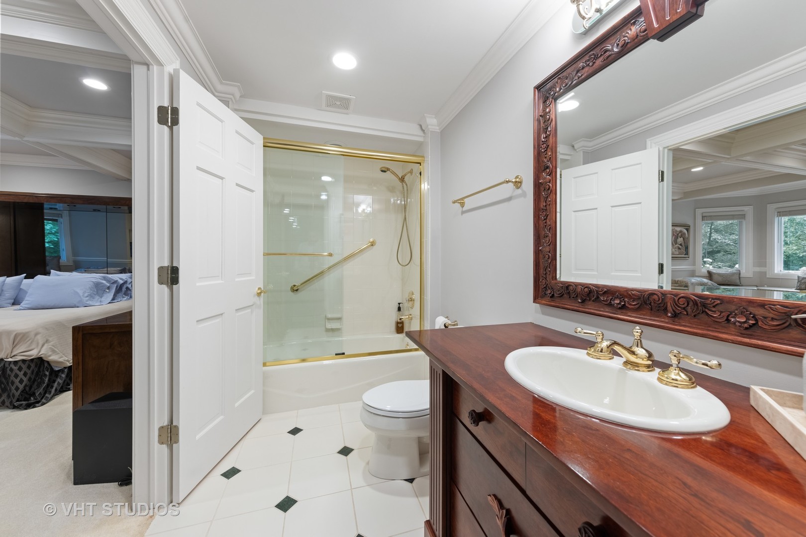 9301 Falling Waters Drive East Burr Ridge, IL 60527 - Photo 29 of 44 a bathroom with a sink double vanity granite tub and shower