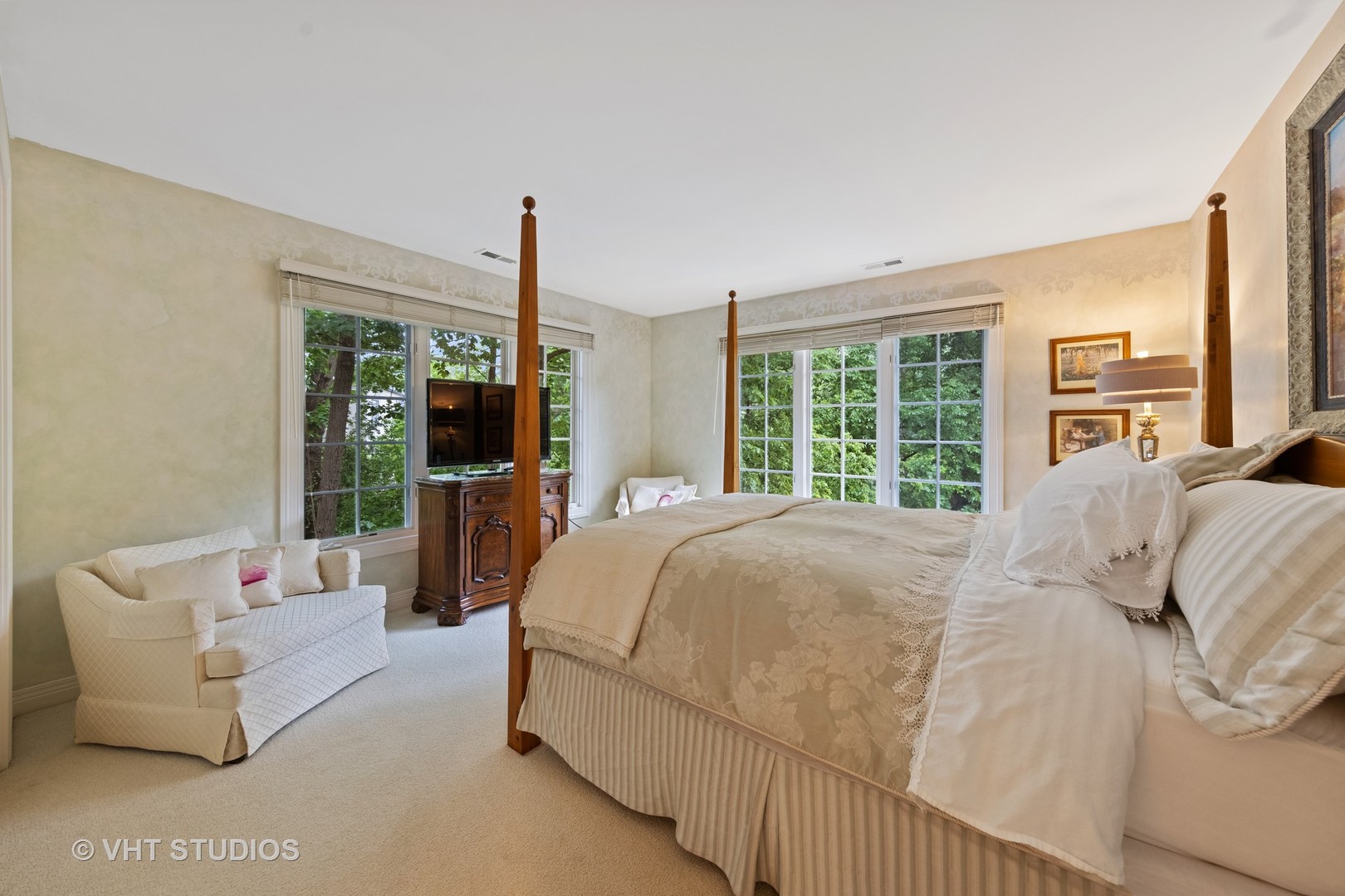 9301 Falling Waters Drive East Burr Ridge, IL 60527 - Photo 36 of 44 a bed sitting in a bedroom next to a large window with balcony view