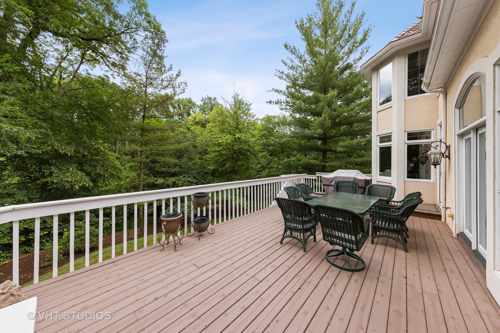 9301 Falling Waters Drive East Burr Ridge, IL 60527 - Photo 5 of 44 a view of backyard with a patio and wooden floor