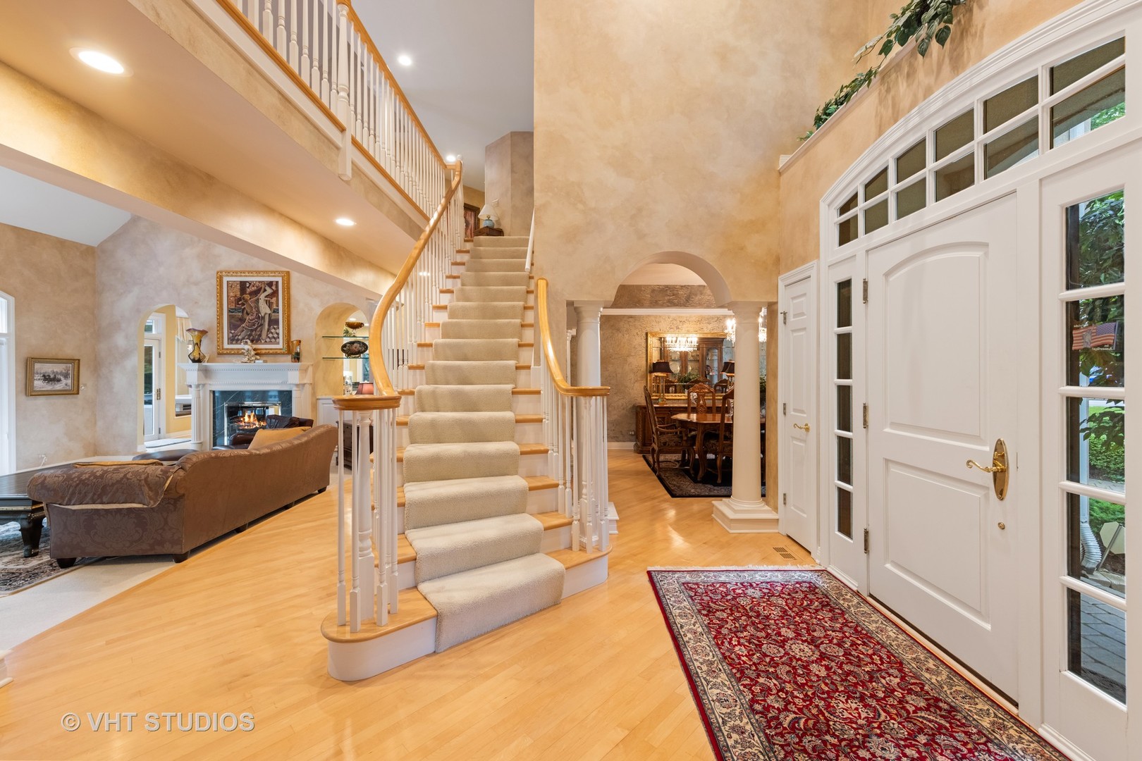 9301 Falling Waters Drive East Burr Ridge, IL 60527 - Photo 7 of 44 a view of a living room with furniture and a rug