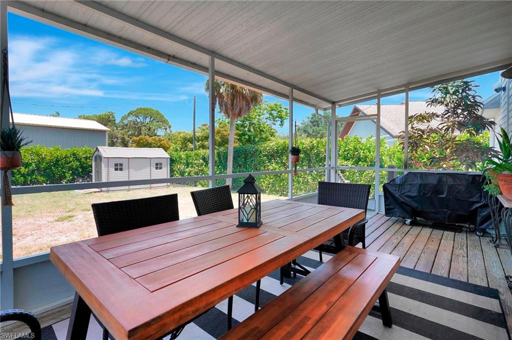 4211 Cindy Avenue Naples, FL 34112 - Photo 24 of 25 a view of a outdoor seating area with furniture