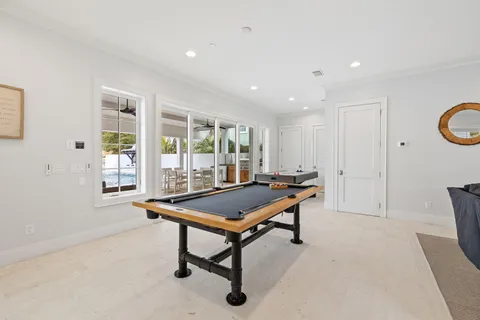 a bedroom with a bed and a table