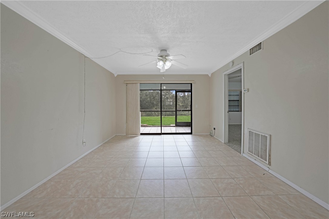 26485 Rampart Boulevard, Unit A6 Punta Gorda, FL 33983 - Photo 14 of 32 a view of an empty room with a window