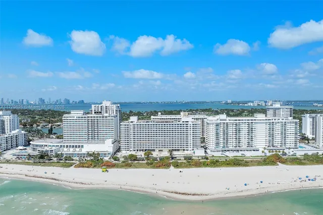 a view of a city with ocean