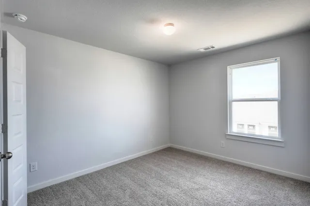 an empty room with a window