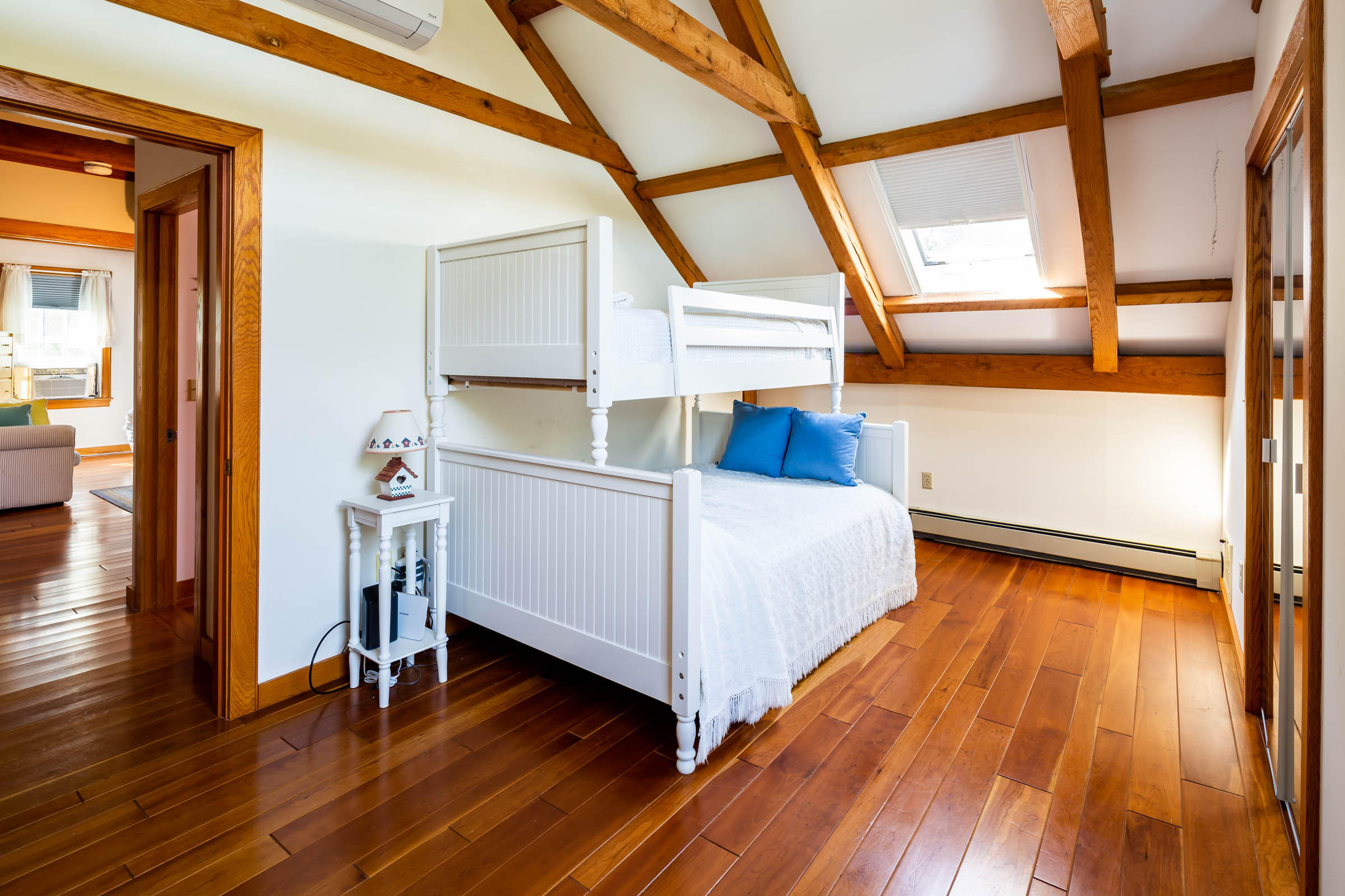 42 Cedar Land Road Orleans, MA 02653 - Photo 35 of 46 a view of bedroom and bedroom with wooden floor