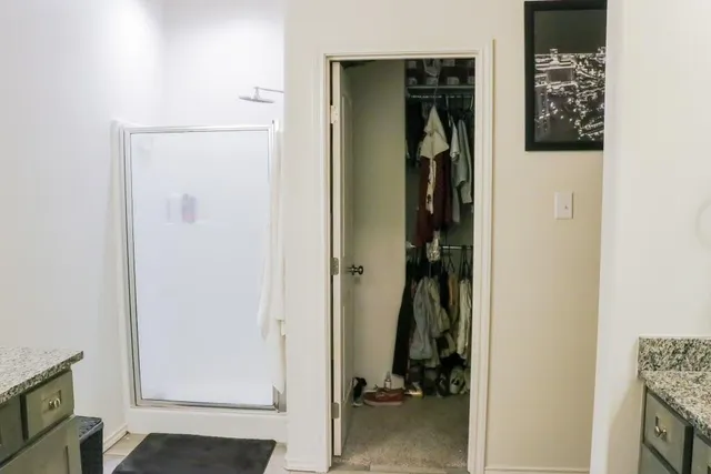 a view of a bedroom from a hallway