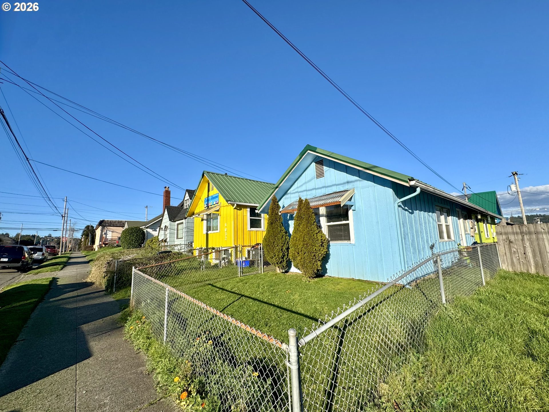 1032 South 4th Street Coos Bay, OR 97420 - Photo 27 of 44 a front view of a house with garden