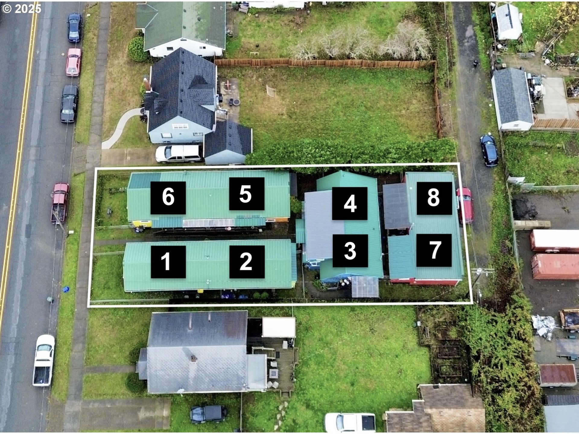 1032 South 4th Street Coos Bay, OR 97420 - Photo 37 of 44 an aerial view of a house with a yard