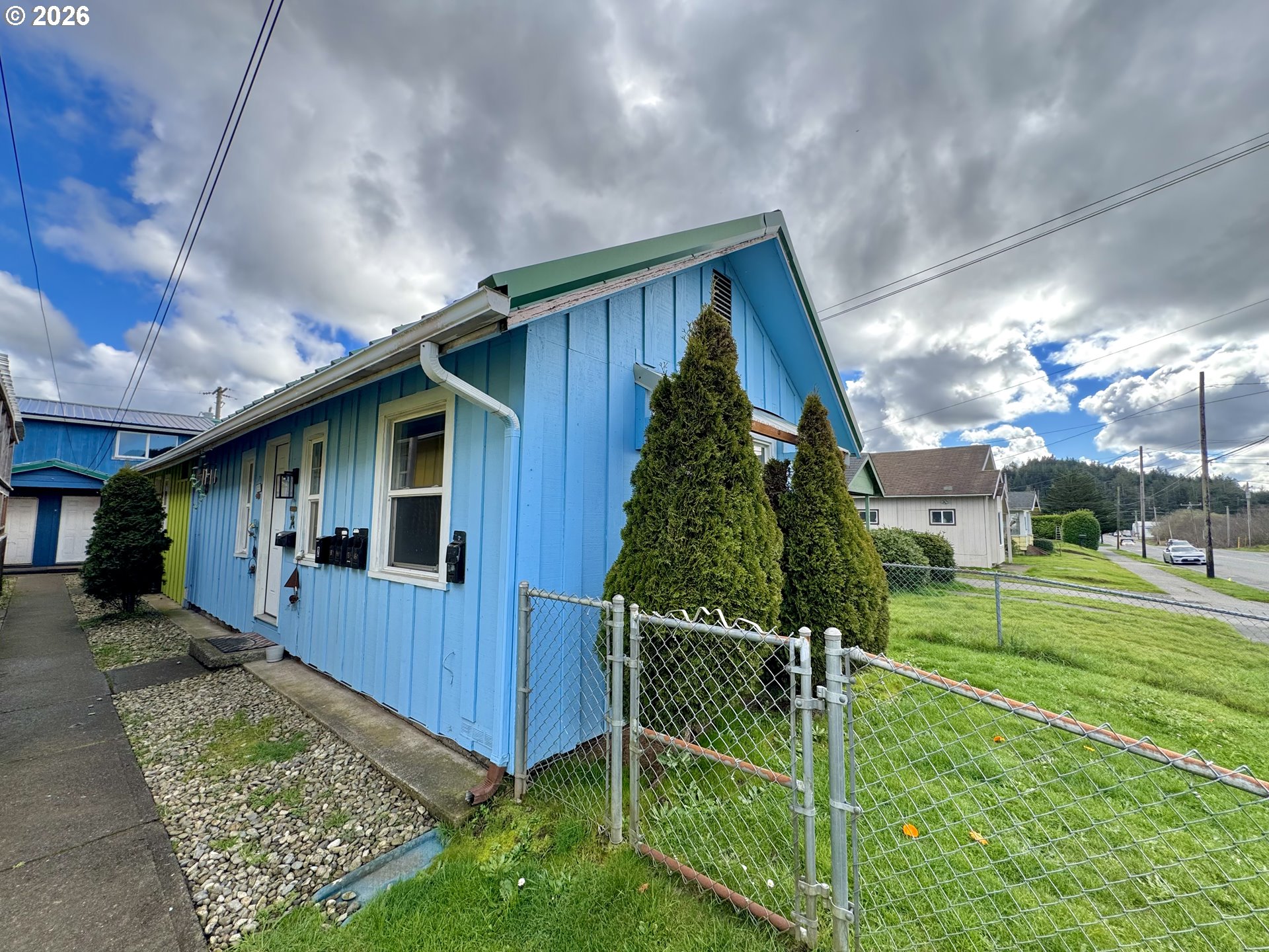 1032 South 4th Street Coos Bay, OR 97420 - Photo 7 of 44 a view of a house with backyard and porch