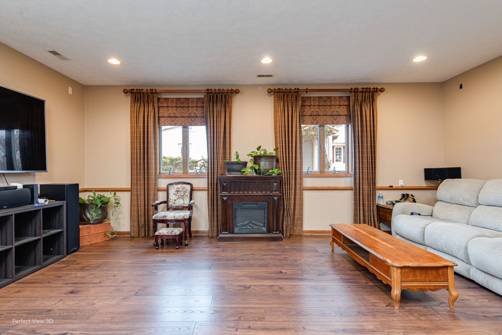 929 Lincoln Street Minonk, IL 61760 - Photo 9 of 26 a living room with furniture and a fireplace
