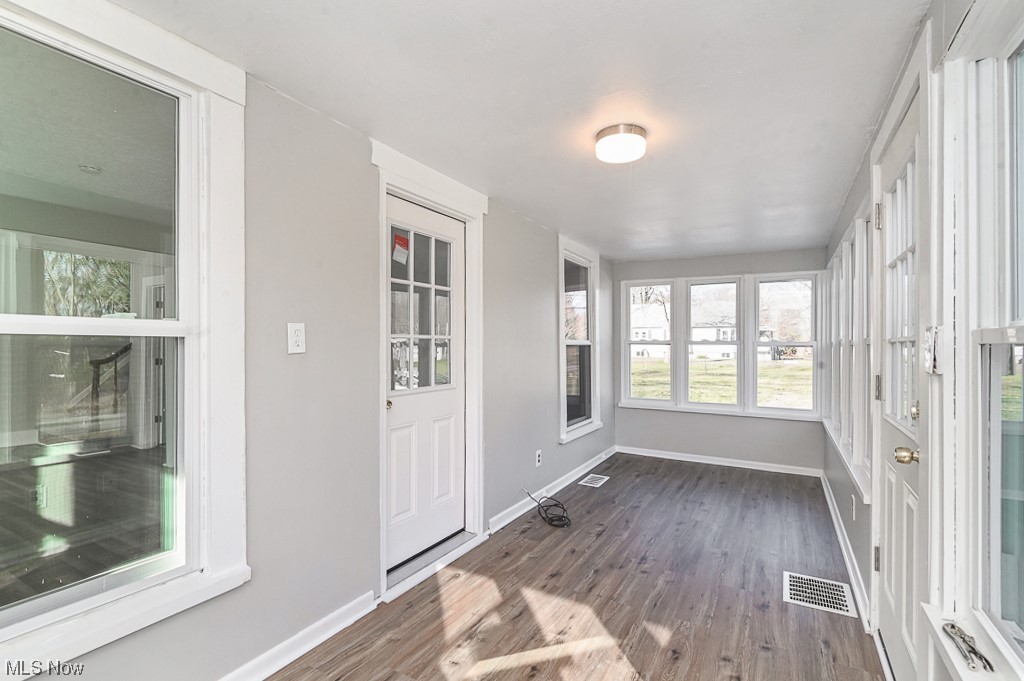 6469 Red Brush Road Ravenna, OH 44266 - Photo 4 of 34 View of unfurnished sunroom