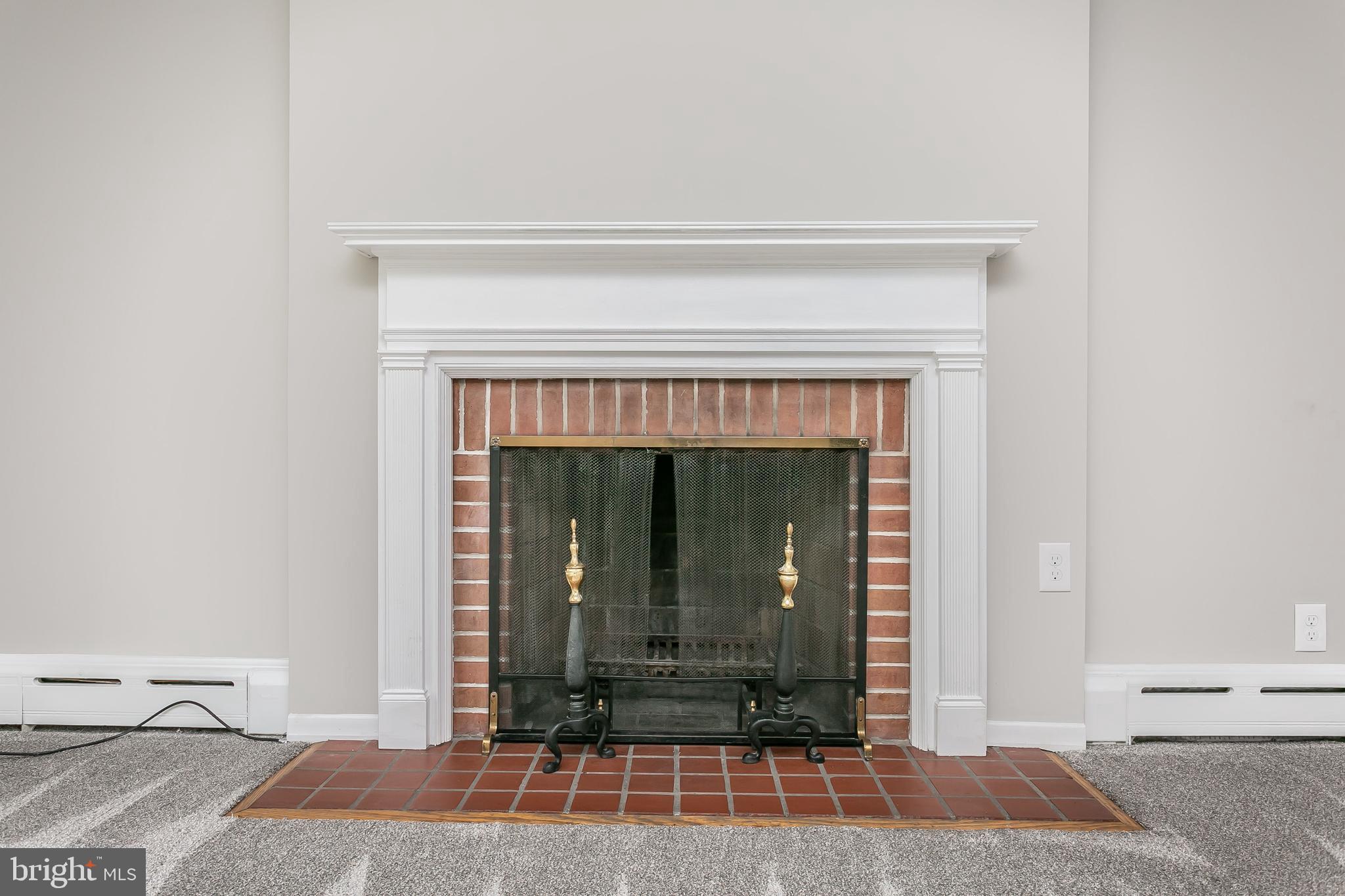 200 Charmuth Road Lutherville-Timonium, MD 21093 - Photo 2 of 30 Living room fire place