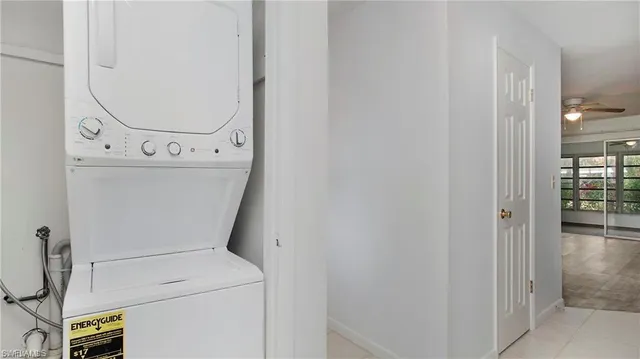 a kitchen with a sink a stove and cabinets