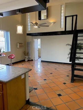 a view of a kitchen with a sink