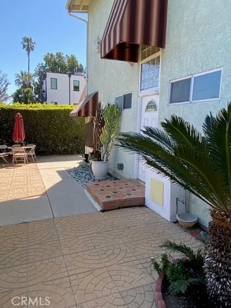 a house view with a outdoor space