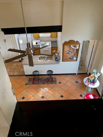 a living room with furniture and flat screen tv